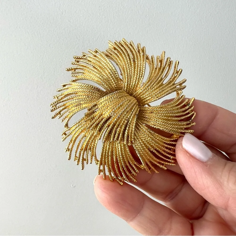 Vintage Monet pin from 1960’s with some patina on the metal - lovely for…